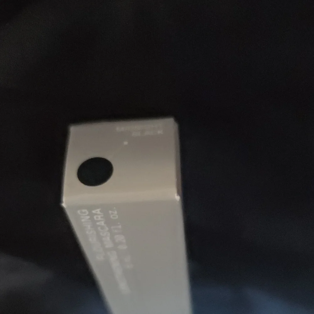 r.e.m. Beauty Lip Gloss in Elegant Silver Box